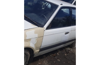 1988 model mazda 323 1.6 çıkma sol ön dolu kapı
