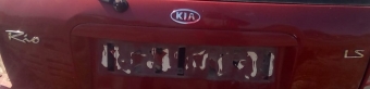2004 kia rio çıkma marka model yazısı.