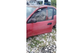 Mazda 323 sol on kapi 