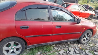 Mitsubishi karizma sag kapilar