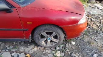 Mitsubishi karizma sag on camurluk 99 model